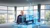 Man using Desigo CC on two monitors.