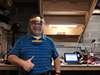 Siemens IT Systems Analyst Greg Siwicki is printing face shields for nurses at his home in Detroit, Michigan.