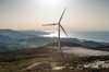 Panoramic view of wind power plant Haouma Windfarm in Morocco, sunset in the Strait of Gibraltav
