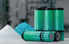 Cutting edge battery materials displayed next to fully completed batteries to represent the future of energy storage Cutting edge battery materials displayed next to fully completed batteries to represent the future of energy storage