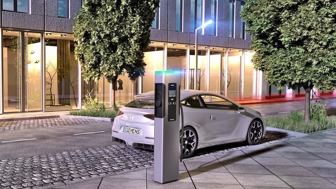 electric car plugged in at night