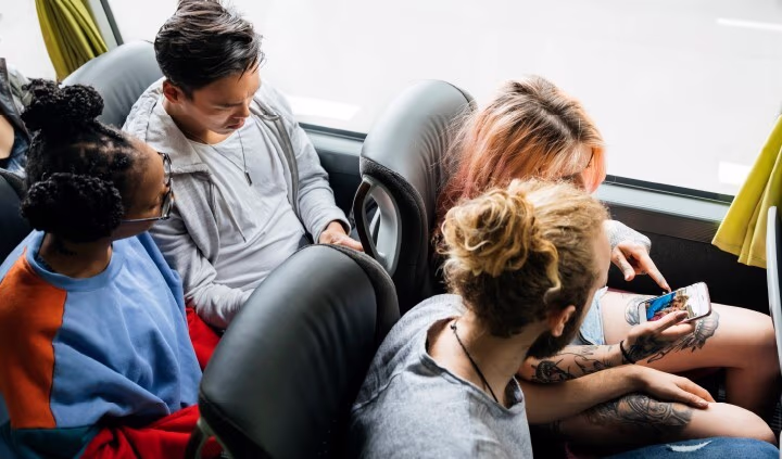Four passengers in a bus Four passengers in a bus